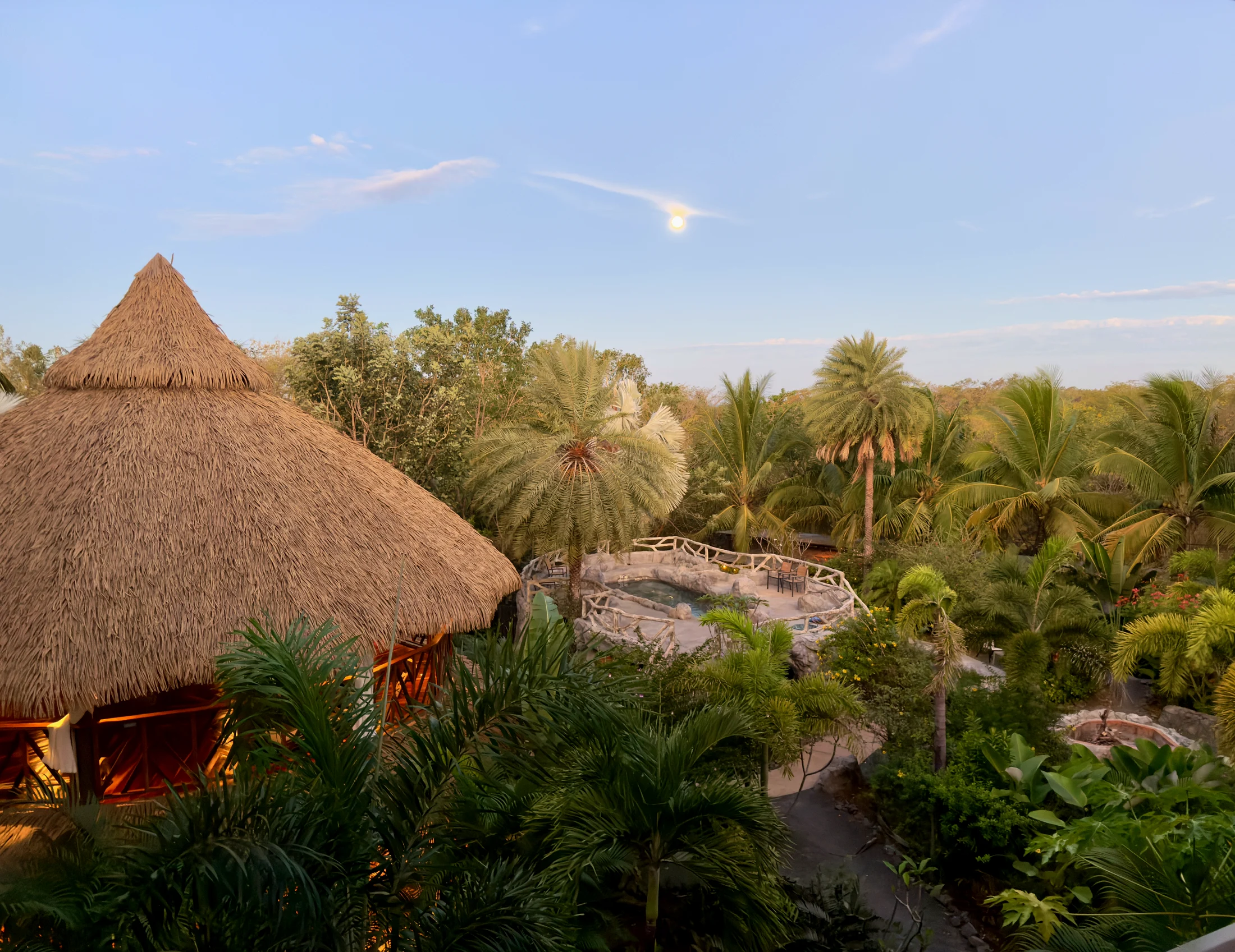 The full moon rising over the shala and jungle sanctuary