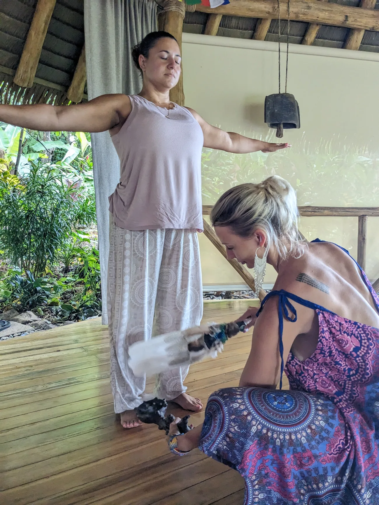 Susan performing a limpia clearing before ceremony