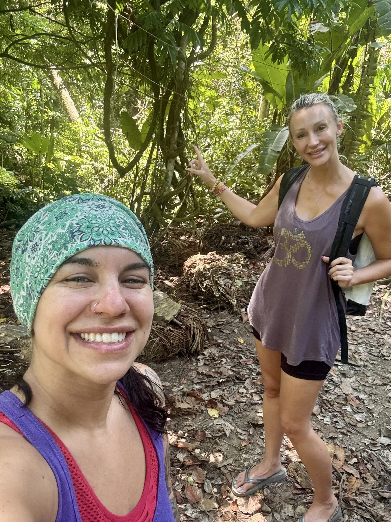 Susan and McKenzie in the jungle among the trees
