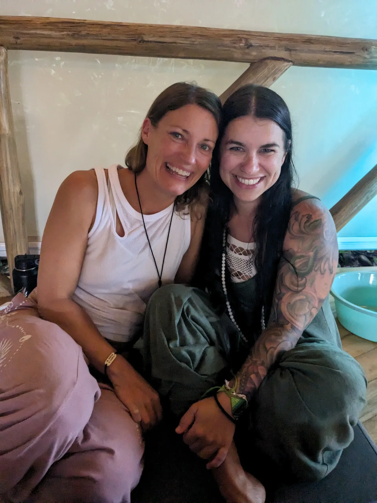 Two women smiling together at the sanctuary