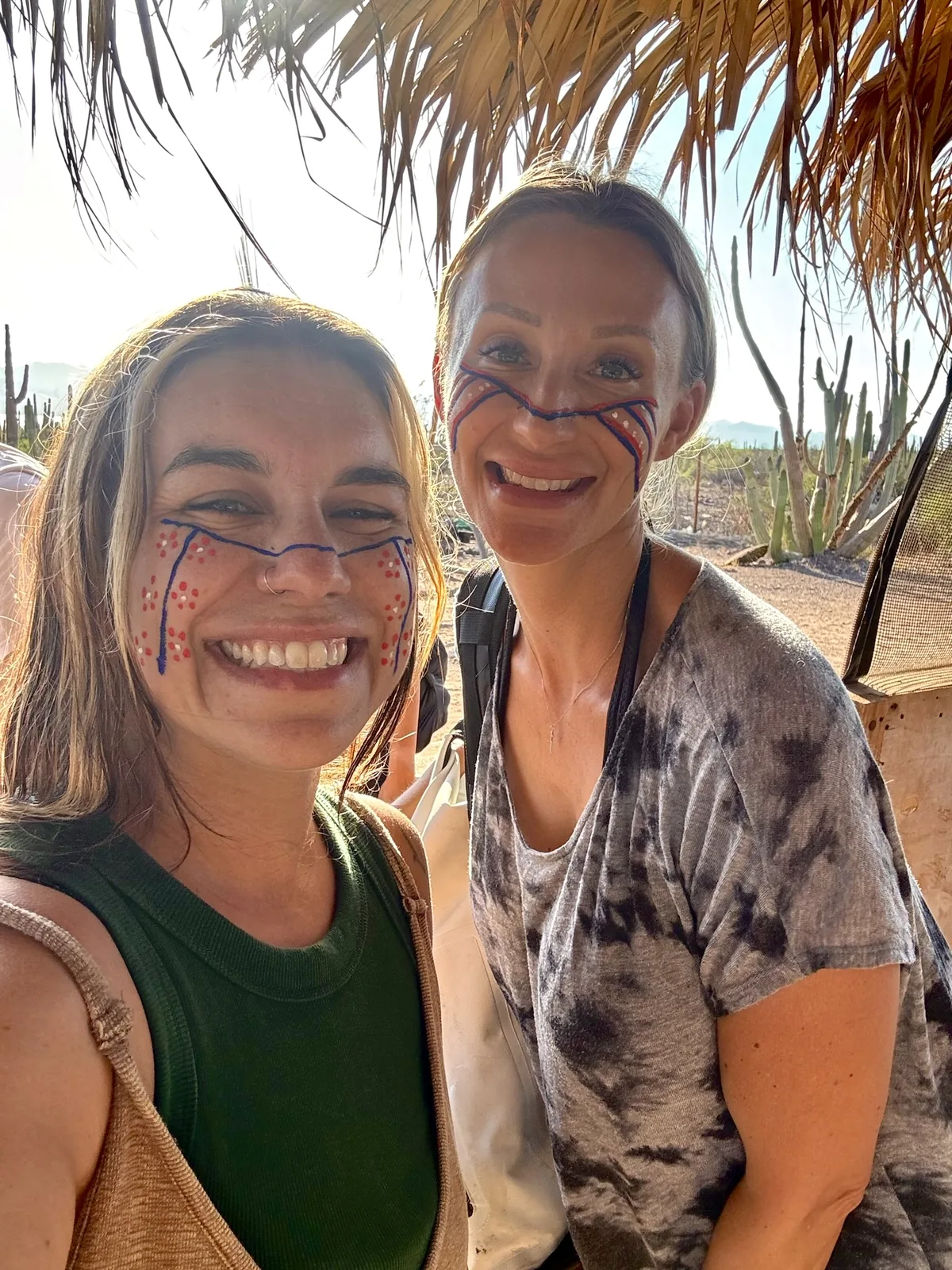Susan and McKenzie with ceremonial face paint in the Sonoran Desert
